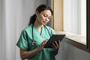 Nurse using a tablet 